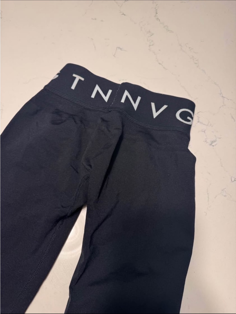 NVGTN Black Leggings with White Branded Waistband